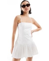 Bershka - Cotton Straight Neck Pleated Mini Dress - Lyst