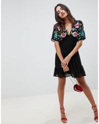 asos mini skater dress with butterfly embroidery