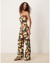 ASOS - Pantalon ample d'ensemble en tissu gaufré à imprimé fruits - Lyst
