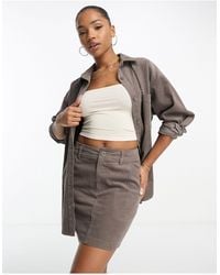 ASOS - Mini-jupe trapèze en velours côtelé avec poches - taupe - Lyst