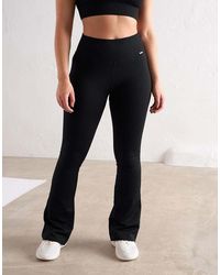 Aim'n - Mallas Negras Acampanadas De Canalé Sin Costuras - Lyst