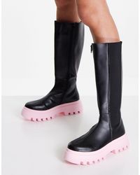 Stivali Asos da Donna: fino al −65% su Stylight