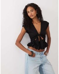 ASOS - Tie Front Cutout Top With Peplum Hem - Lyst