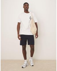 ASOS - Pantalones Cortos Azul Marino Básicos De Largo Medio Y Corte Slim De - Lyst