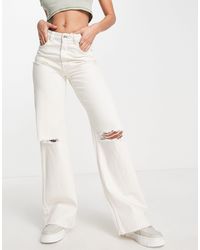Pantaloni zampa Pantaloni e jeans per Donna di Bershka | FASHIOLA.it