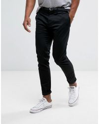 Pantalones, pantalones de vestir y chinos Pull\u0026Bear de hombre desde 18 €