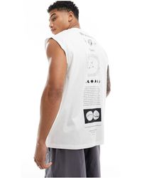 ASOS - Camiseta hueso extragrande sin mangas con estampado en el centro - Lyst