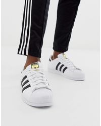 white superstar trainers