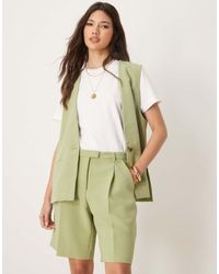 Vila - Longline Tailored Shorts - Lyst