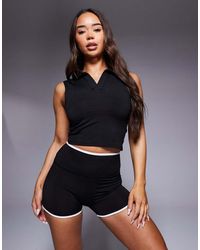 4505 - Tennis Active Sleeveless Cropped Polo Shirt - Lyst