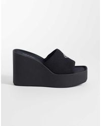 Calvin Klein - Jeans Canvas Wedge Sandal - Lyst