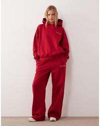 Kaiia - Studio Cotton Rich Embroidered Logo Wide Leg joggers Co-ord - Lyst