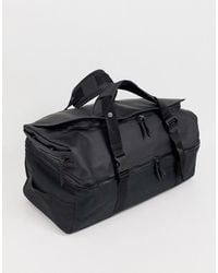 Rains 1317 Waterproof Duffel Backpack In Black