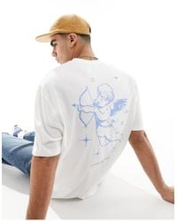 ASOS - T-shirt oversize bianca con stampa di cherubini sul retro - Lyst
