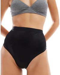 Spanx - Shape Invisible Lightweight Shaping Thong - Lyst