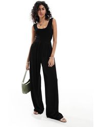 ASOS - Tuta Jumpsuit A Fondo Ampio Nera Stropicciata Con Spalline Sottili E Corpino Arricciato - Lyst
