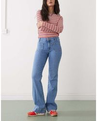 Wrangler - Flared Jeans Met Zakken Aan De Voorkant - Lyst