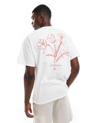ASOS - T-shirt oversize bianca con stampa di fiori sul retro - Lyst