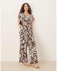 Mango - V Neck Belted Jumpsuit - Lyst