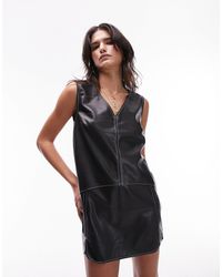 TOPSHOP - Faux Leather Top Stitch Mini Pinafore - Lyst