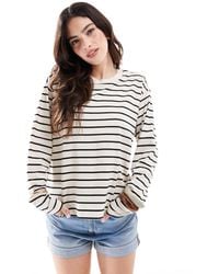 Monki - – langärmliges oversize-oberteil mit schwarz-weißem streifenmuster - Lyst