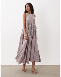 Ghospell - – ärmelloses, gerafftes midikleid mit kordelzug, bindedetail und vichy-karo - Lyst