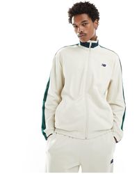 New Balance - Sportswear greatest hits - giacca beige con zip - Lyst