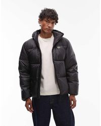 Lacoste - Chaqueta Negra Acolchada Con Capucha De - Lyst