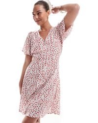 ONLY - – minikleid mit em blümchenmuster, v-ausschnitt und taillenschnürung - Lyst