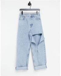 TOPSHOP – joni – enge, e jeans mit rissen in Schwarz | Lyst DE