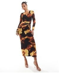 Flounce London - Plunge Front Mesh Maxi Dress With Twist Font - Lyst