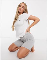 Calvin Klein – CK One – Kurz geschnittenes Lounge-T-Shirt mit Logo - Weiß