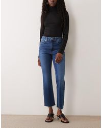 GOOD AMERICAN - Soft Tech Good Legs Slim Straight Leg Jeans - Lyst
