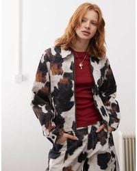Reclaimed (vintage) - Cow Print Zip Up Jacket Co-ord - Lyst