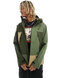 Polo Ralph Lauren - Eastland - giacca a vento color block oliva e multicolore con logo a icona - Lyst
