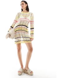 ASOS - Gestreepte Gebreide Mini Jurk Met Lange Mouwen En Open Steken - Lyst