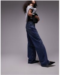 TOPSHOP - Ember - jeans a fondo ampio e vita bassa medio - Lyst
