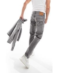Levi's - 502 Taper Fit Jeans - Lyst