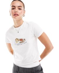 ASOS - Camiseta blanca con diseño encogido y estampado gráfico "girl breakfast, lunch and dinner" - Lyst
