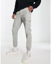 Jack & Jones - Intelligence - pantaloni cargo grigio chiaro con fondo elasticizzato - Lyst