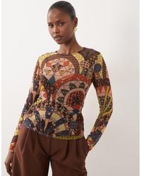 Never Fully Dressed - Mesh Top Met Ronde Hals En Lange Mouwen - Lyst