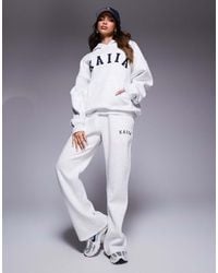 Kaiia - Cotton Blend Embroidered Logo Wide Leg Trackies - Lyst