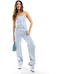 Abercrombie & Fitch - Tuta jumpsuit di jeans senza spalline lavaggio chiaro - Lyst