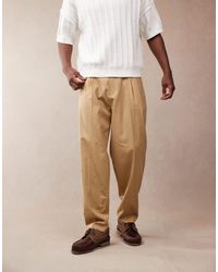 ASOS - Pantalon habillé coupe oversize fuselée en lin mélangé avec pli sur le devant - camel - Lyst