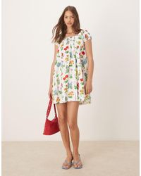 Tyler McGillivary - Uma Flower Print Mini Smock Dress - Lyst
