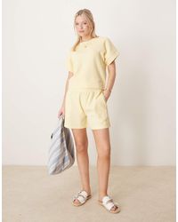 ASOS - Pantalones Cortos Amarillo Limón De Corte Alargado De Punto Gofrado De - Lyst