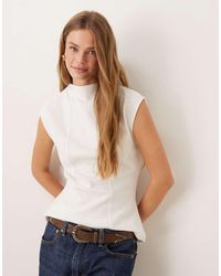 ASOS - Top Senza Maniche Morbido Al Tatto Inverno Con Peplo, Scollo A Barchetta E Cuciture A Vista - Lyst