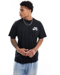 Nike - Nike - sb - t-shirt nera con logo sul petto - Lyst