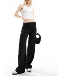 Pull&Bear - Pantaloni sartoriali a fondo ampio neri con motivo gessato e bordi a contrasto - Lyst