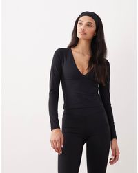 Tala - Dayflex - top manches longues à col v et soutien intégré - Lyst